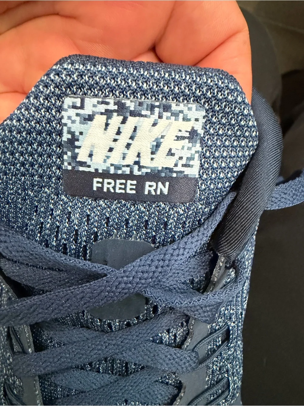 Nike men’s Navy Blue and Light Blue Knit Sneakers